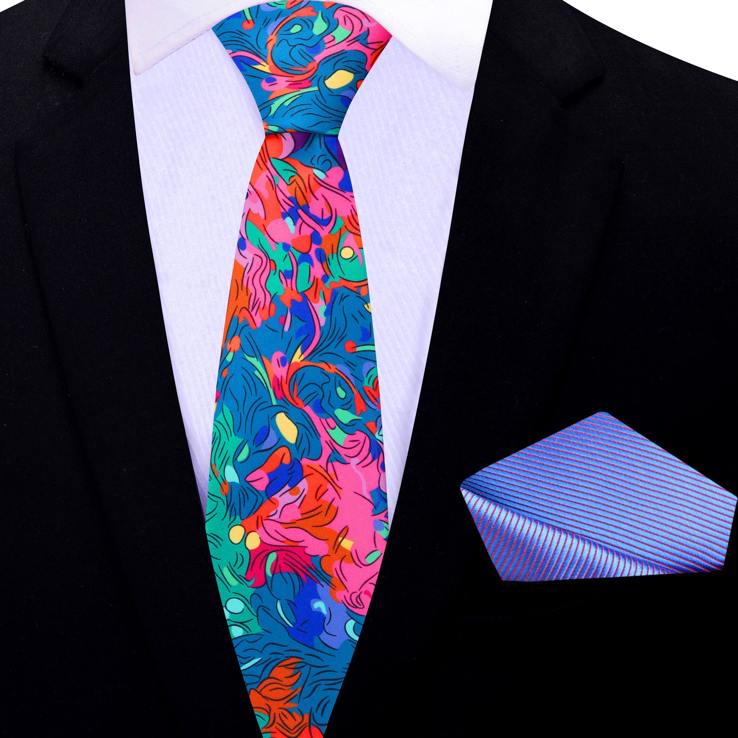 The artisan mosaic necktie styled with a light blue dress shirt and navy suit, perfect for business meetings.