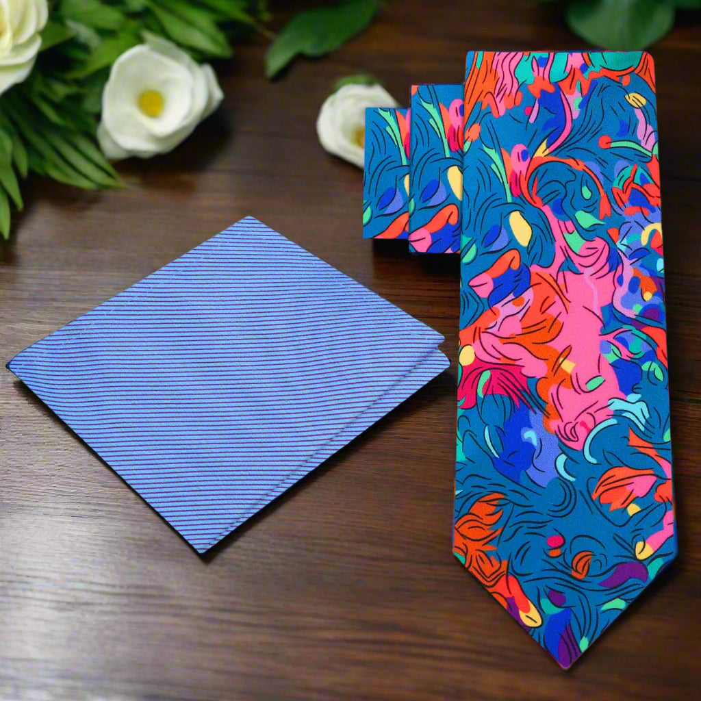 Front view of the vibrant artisan mosaic necktie showcasing the intricate abstract design in blue, green, red, and pink.