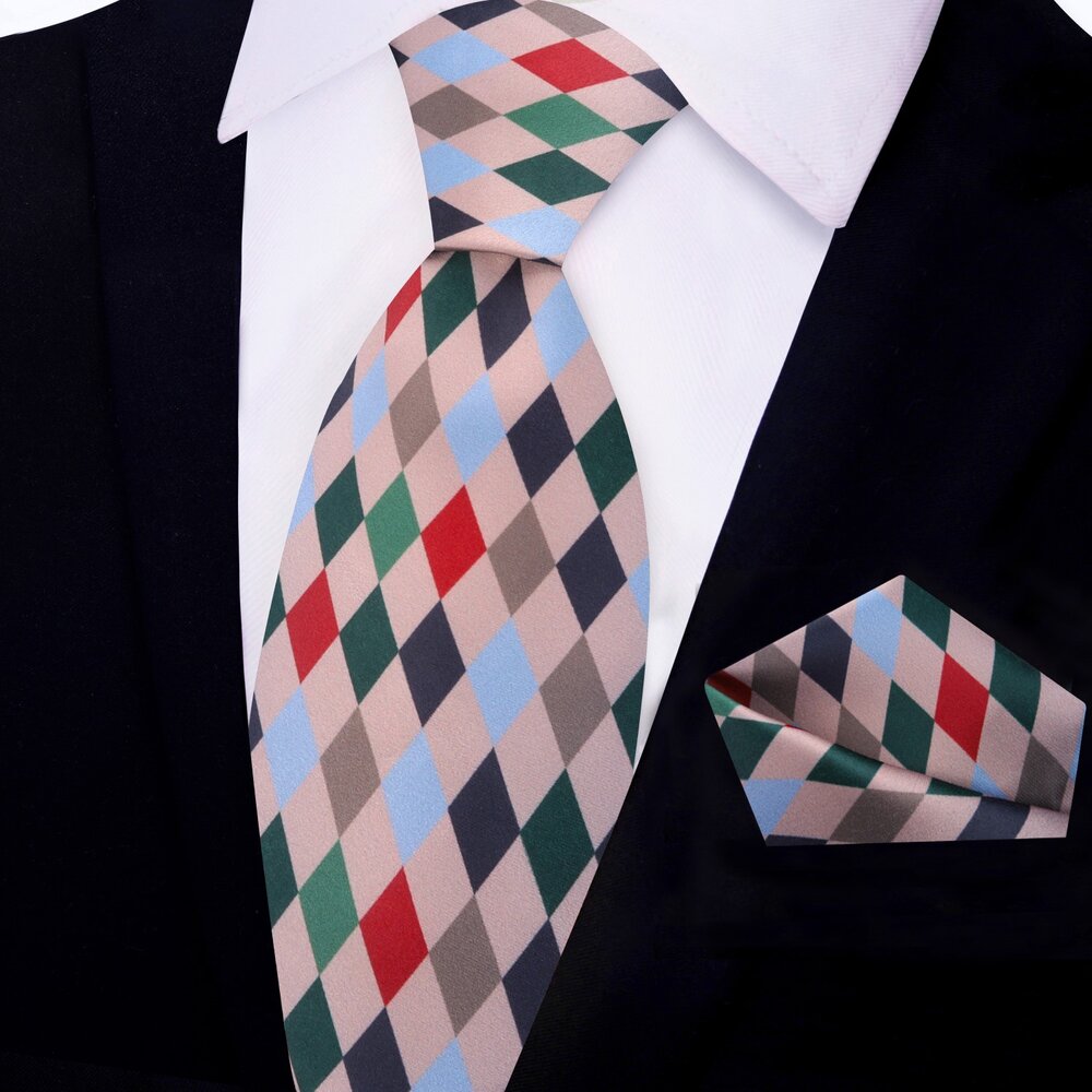 Man wearing a festive silk tie with matching pocket square for holiday party