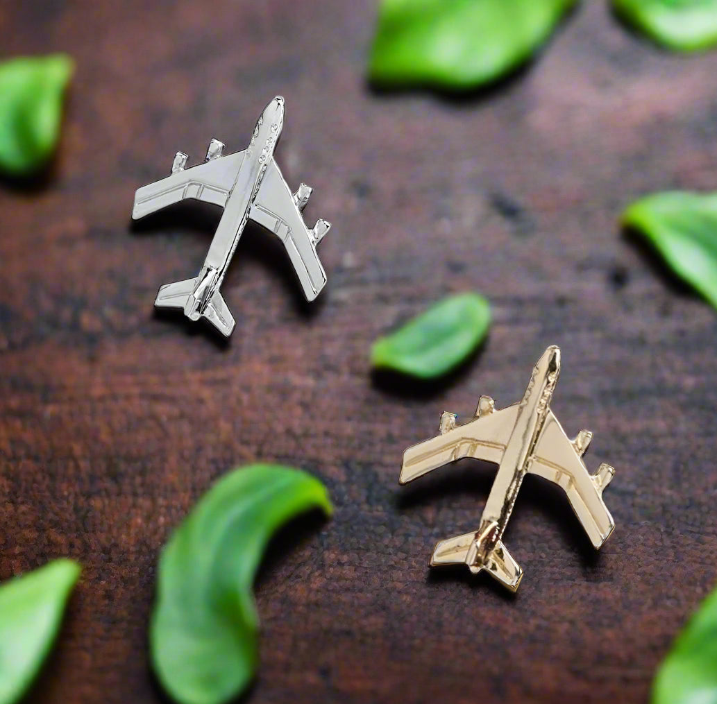Gold aviation lapel pin displayed on a blazer lapel, ideal for pilot gifts.