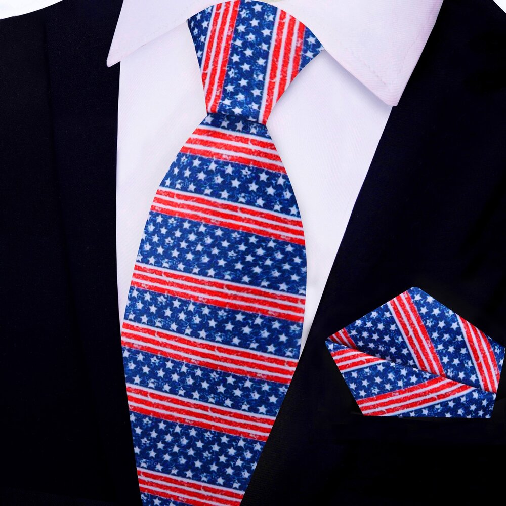 Man wearing a patriotic tie with a navy suit during a political rally