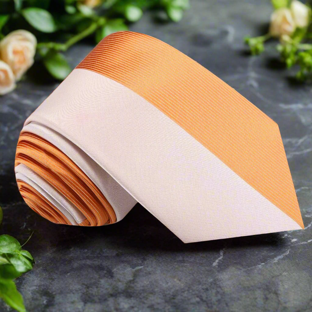 Front view of the two tone silk necktie with cream and orange split design