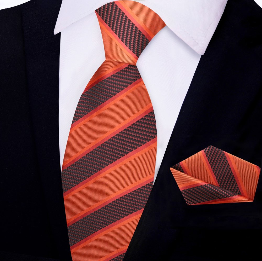Elegant silk necktie and handkerchief set displayed on a wooden surface for networking events