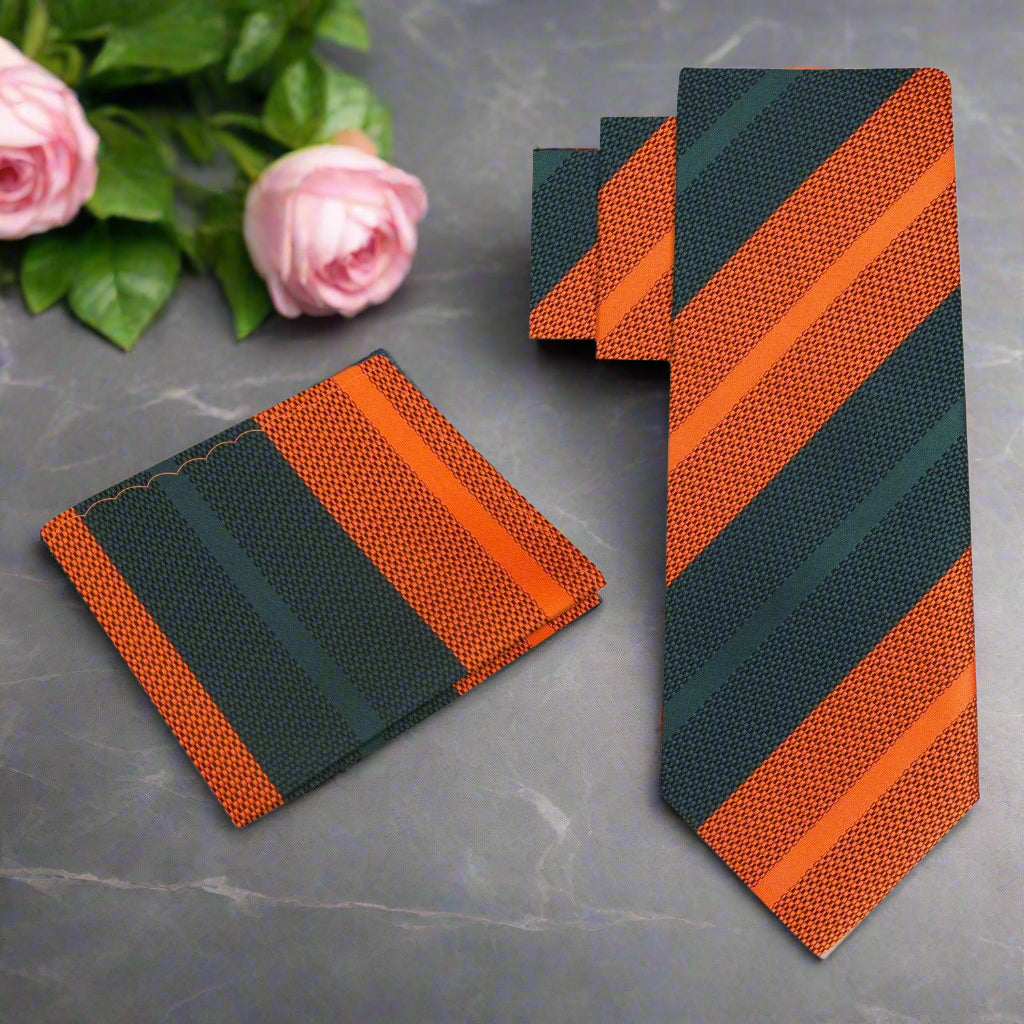Elegant Pink and Grey Striped Silk Necktie displayed on a crisp white shirt.