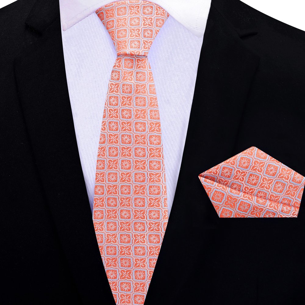 Man wearing silk necktie with geometric pattern at a wedding reception