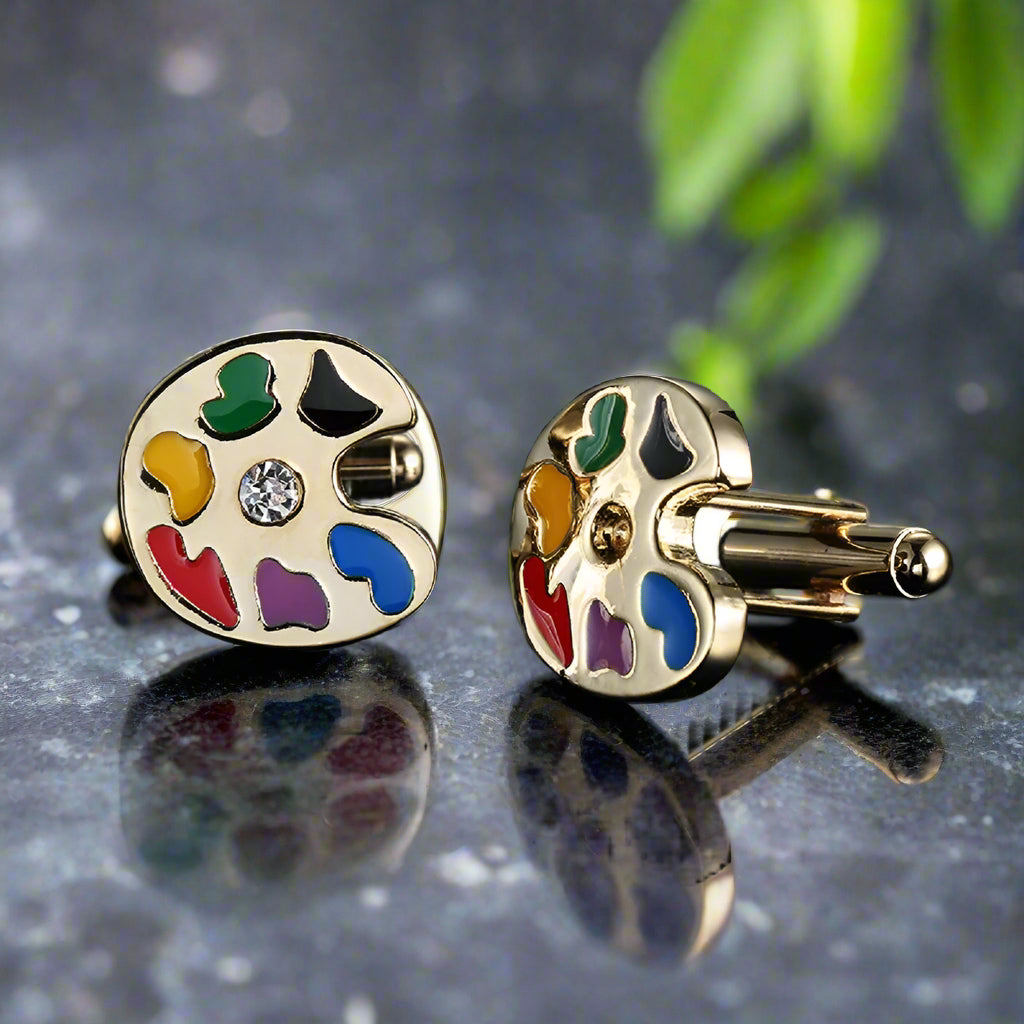Stylish tie bar with intricate vine design on a white dress shirt