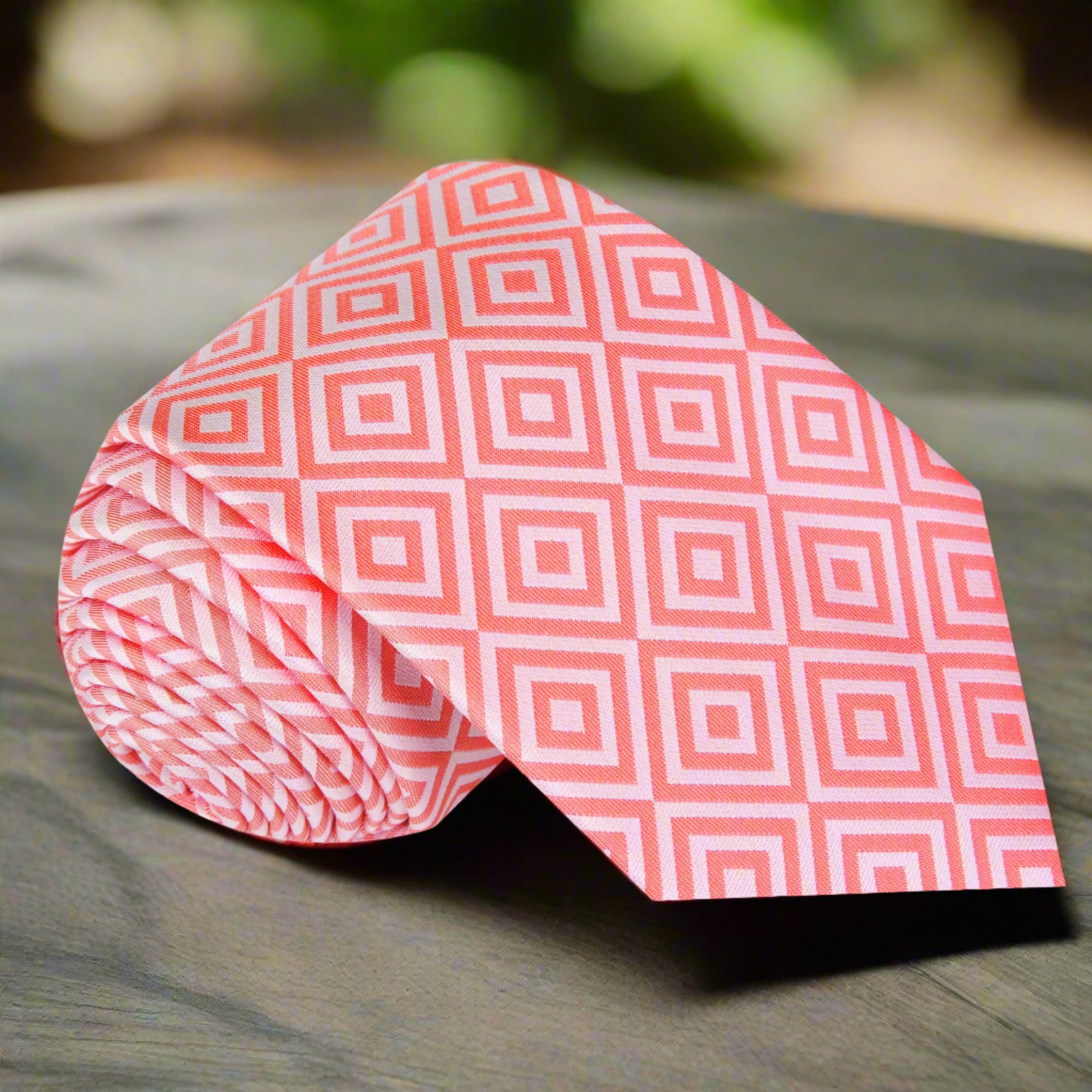 Front view of a stylish geometric silk necktie with modern pattern for weddings