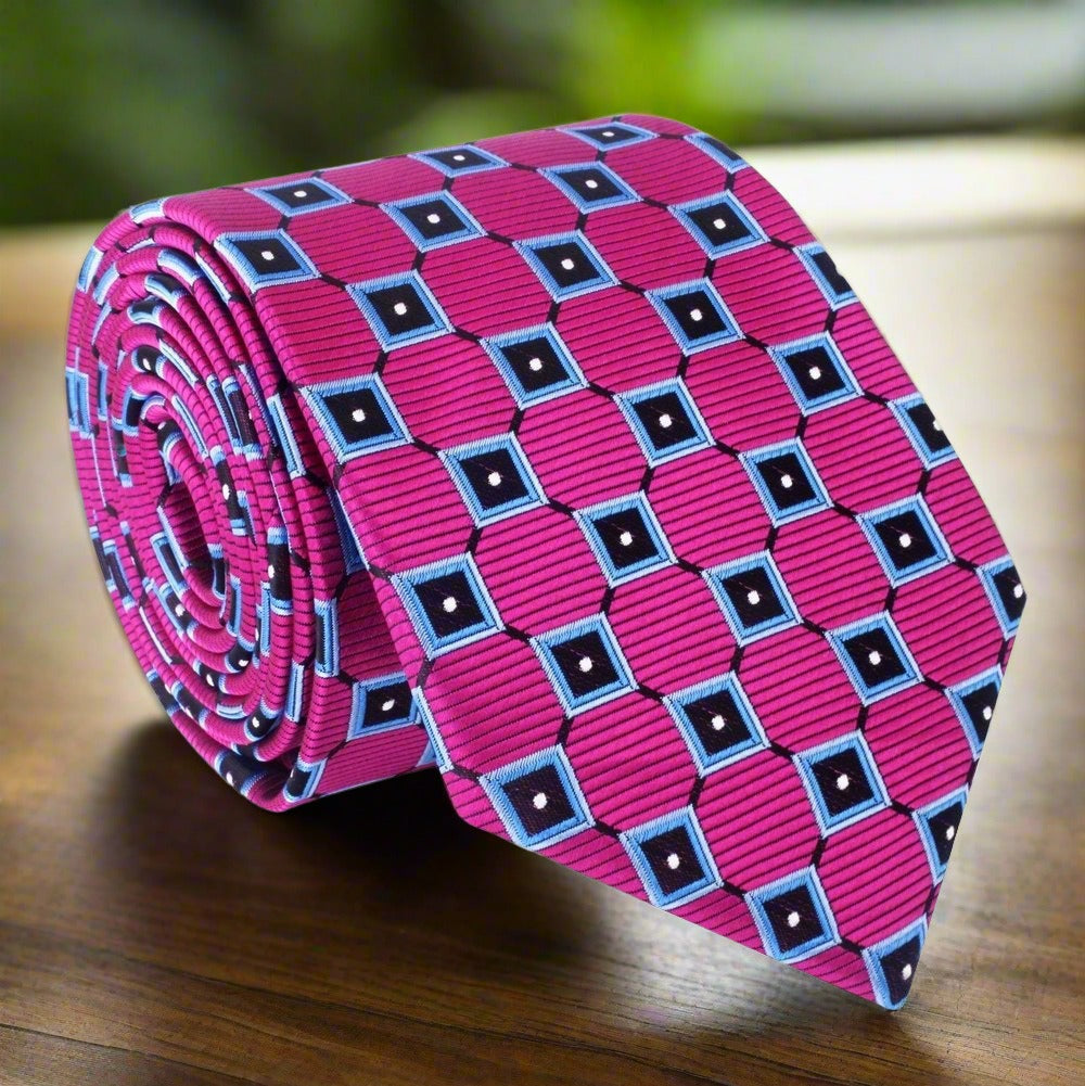 Elegant pink silk geometric tie with navy blue accents, ideal for weddings and formal occasions