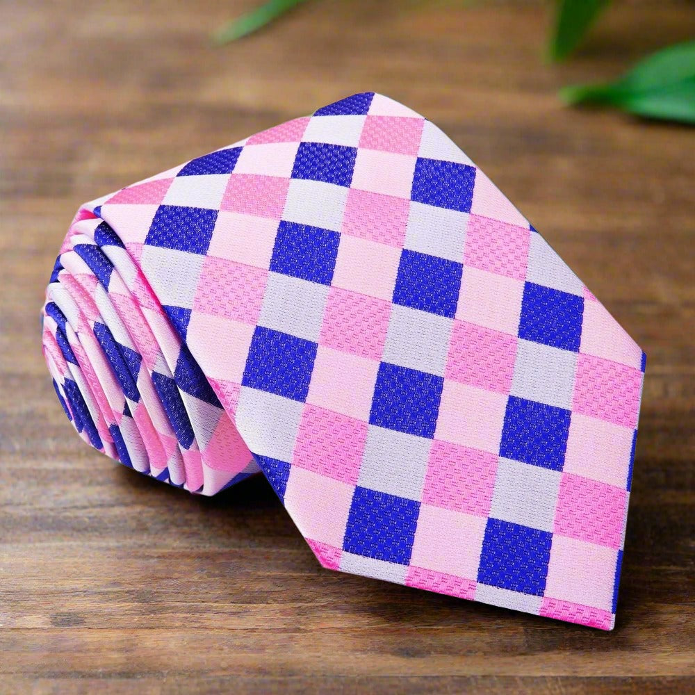 Elegant plaid silk necktie showcasing a light yellow and blue pattern, draped elegantly over a suit.