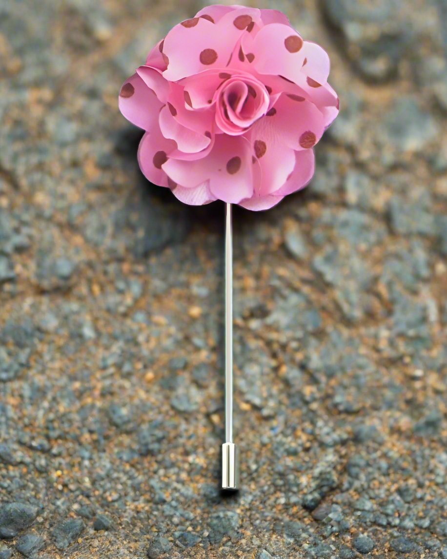 Polka dot lapel pin on a mens suit, showcasing colorful polka dots for fashion