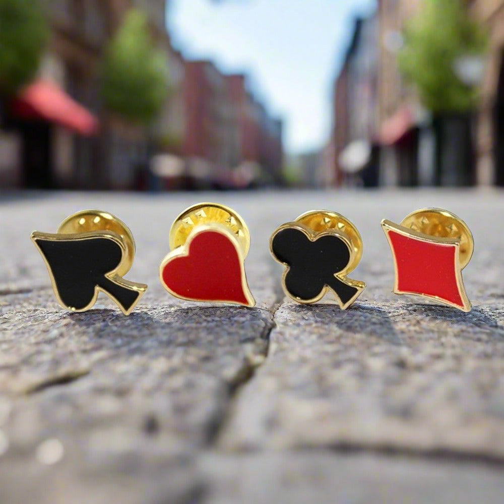 Heart lapel pin against a white dress shirt, showcasing elegance.