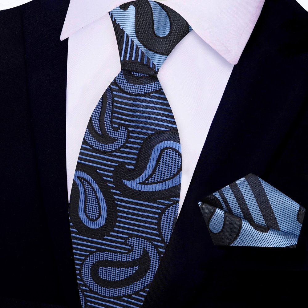 Silk tie with paisley design paired with a white dress shirt