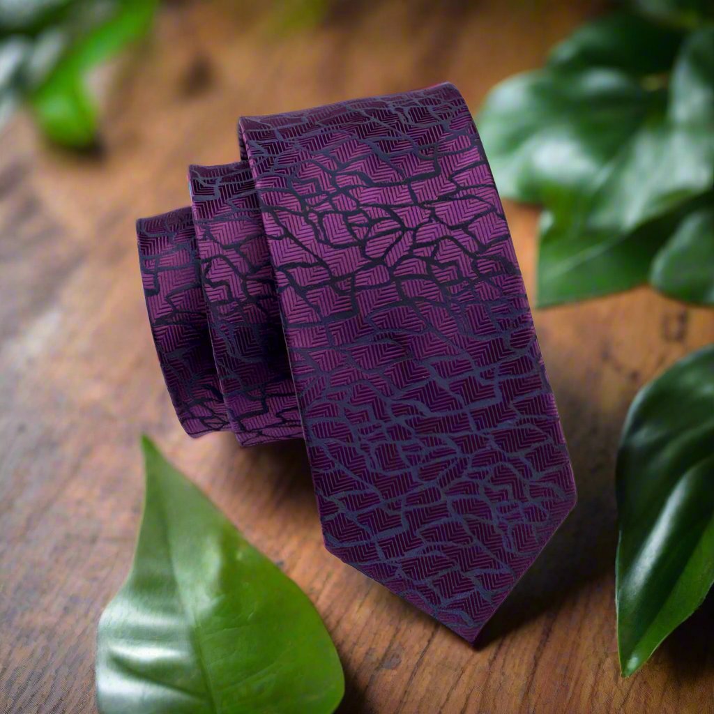 Silk tie with cracked cement pattern in dark blue and black, stylish men's accessory