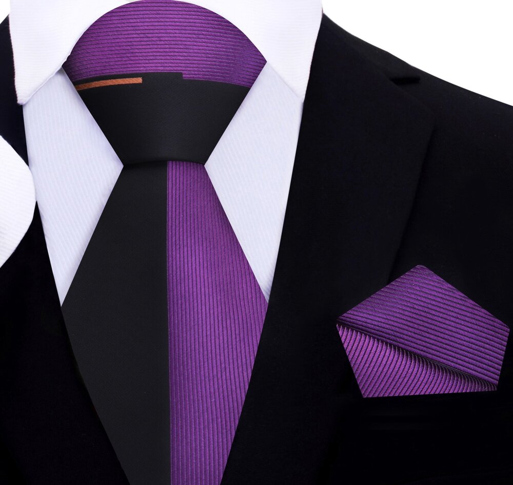The two-toned silk necktie paired with a crisp white shirt, perfect for business.
