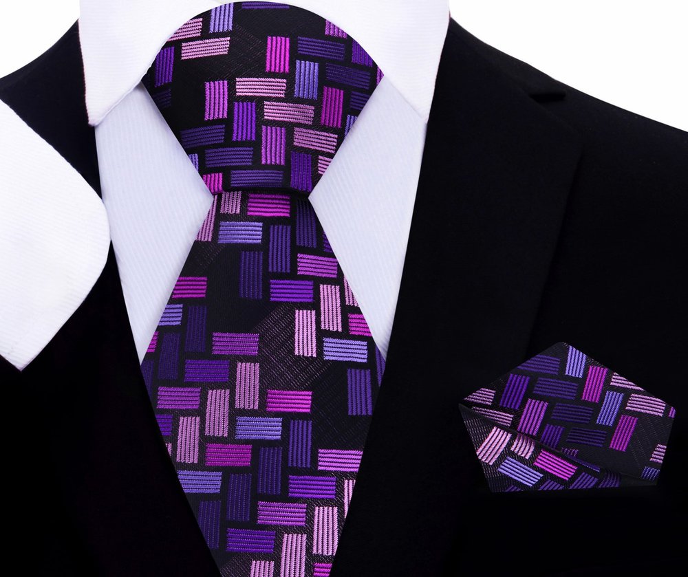 Mens silk tie worn with a white dress shirt, highlighting the vibrant purple shades.