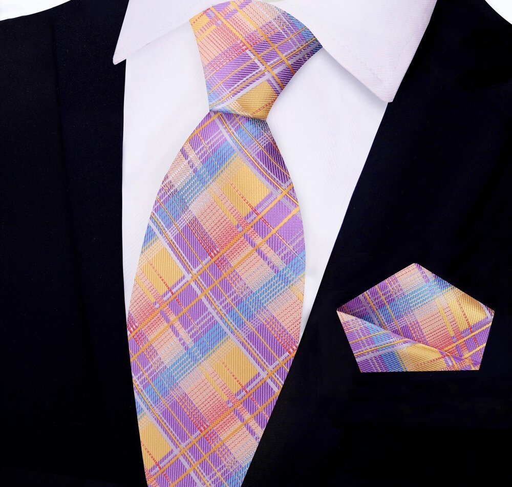 Model wearing the vibrant silk plaid tie with a white dress shirt and navy suit, suitable for business or wedding