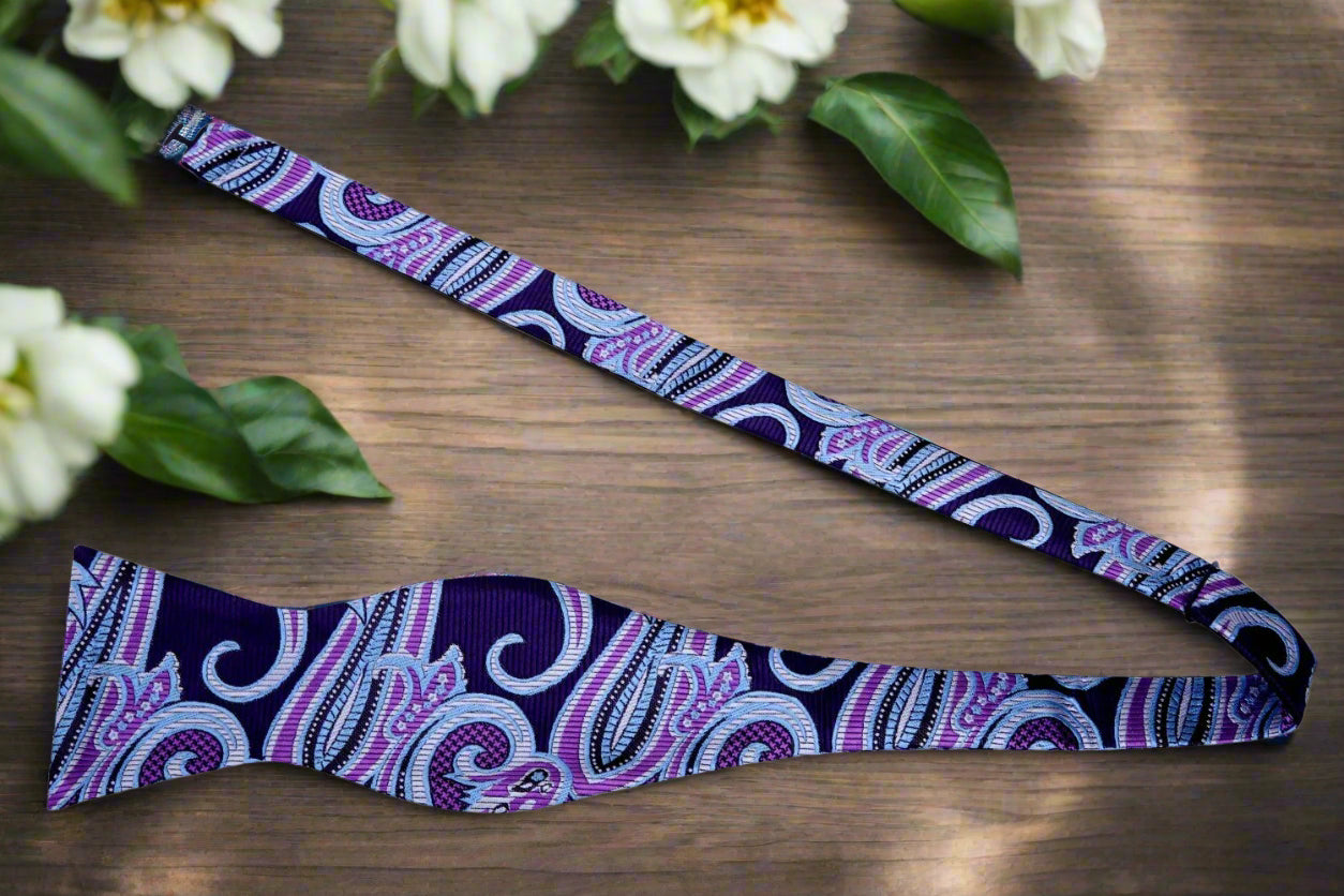 Worn with a navy suit, this bow tie offers a refined and elegant look for evening events.