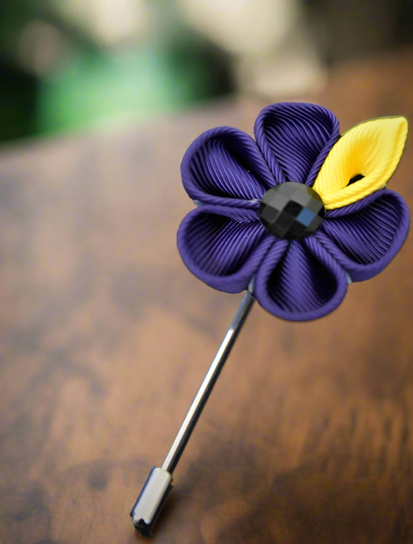 Close-up of the lapel flower showcasing intricate design and craftsmanship.