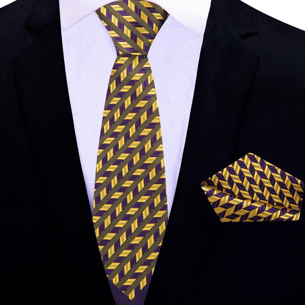 Model wearing the elegant purple geometric silk necktie at a formal event, demonstrating its stylish appeal.