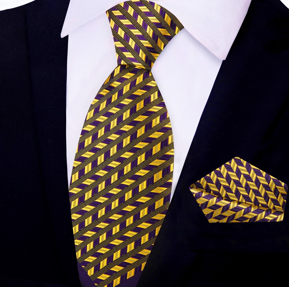 Elegant purple geometric silk necktie displayed on a white background, showcasing its intricate design and vibrant colors.