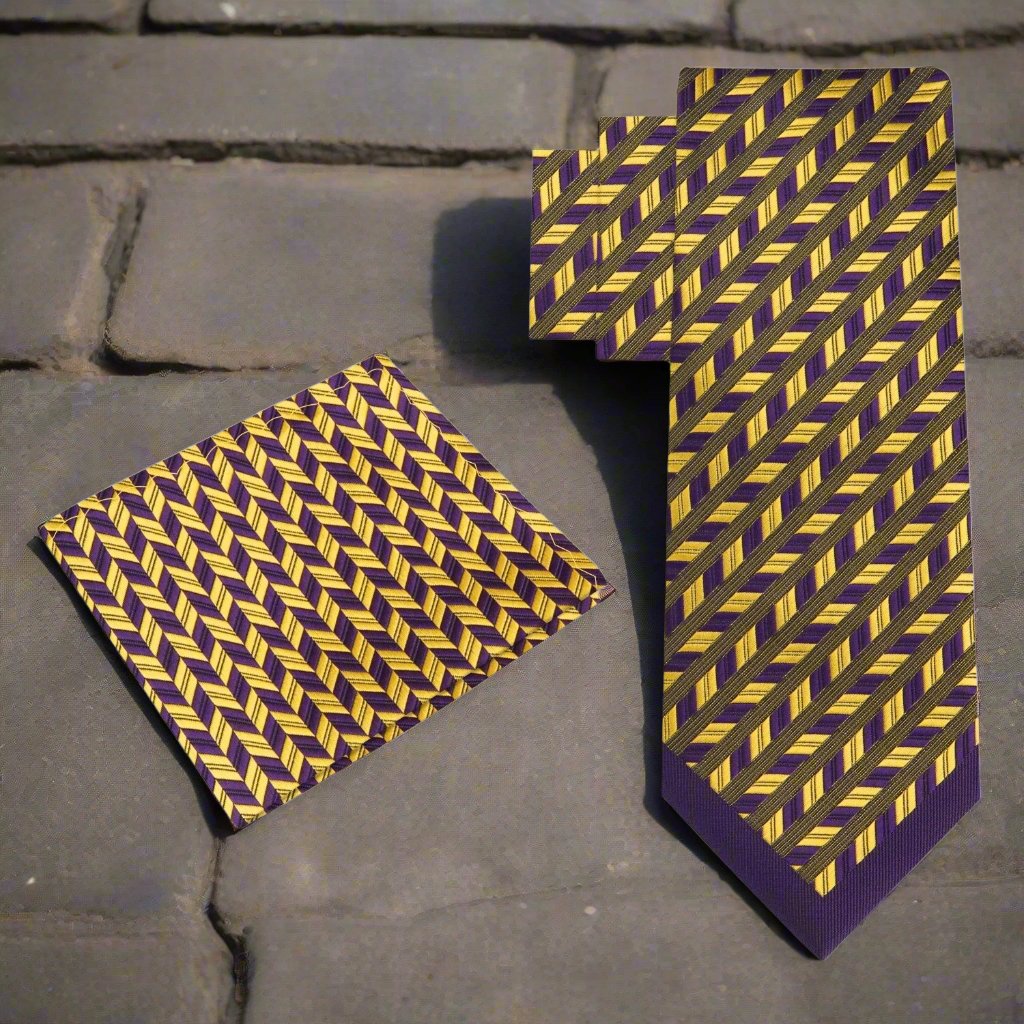A close-up of the purple geometric tie folded neatly with a matching pocket square, perfect for formal occasions.