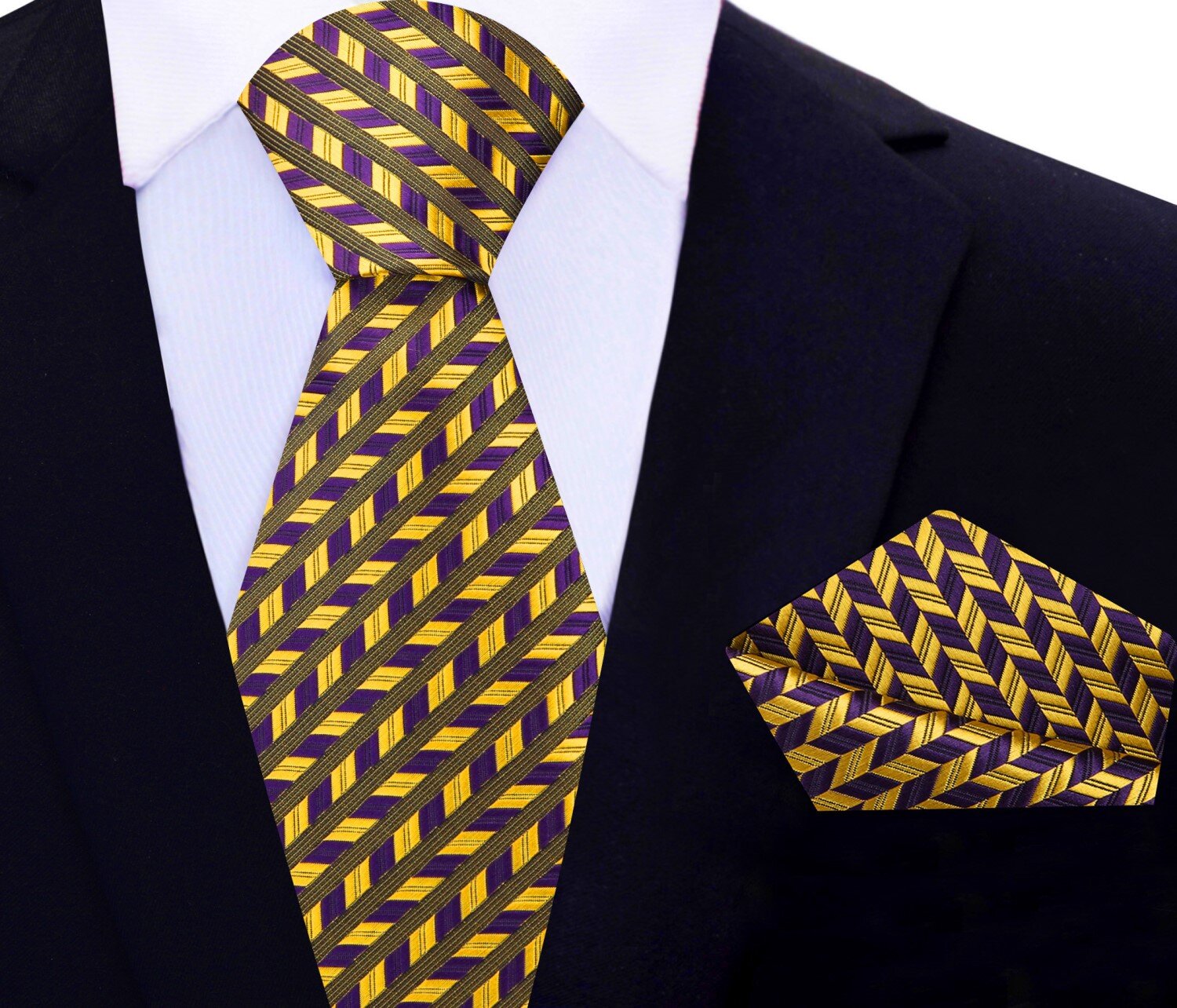 A close-up of the purple geometric tie folded neatly with a matching pocket square, perfect for formal occasions.