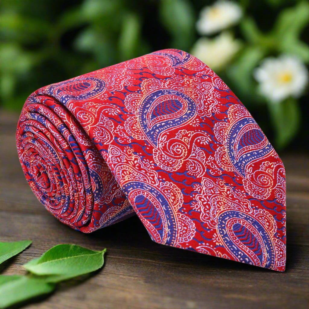 Vibrant red paisley silk tie with blue accents, perfect for weddings and formal events