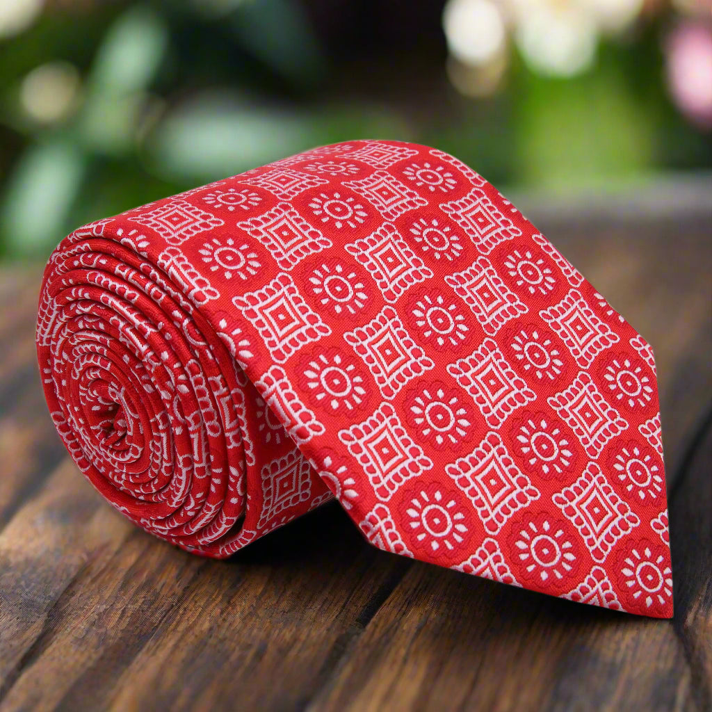 Front view of Providence men's geometric silk necktie with vibrant pattern