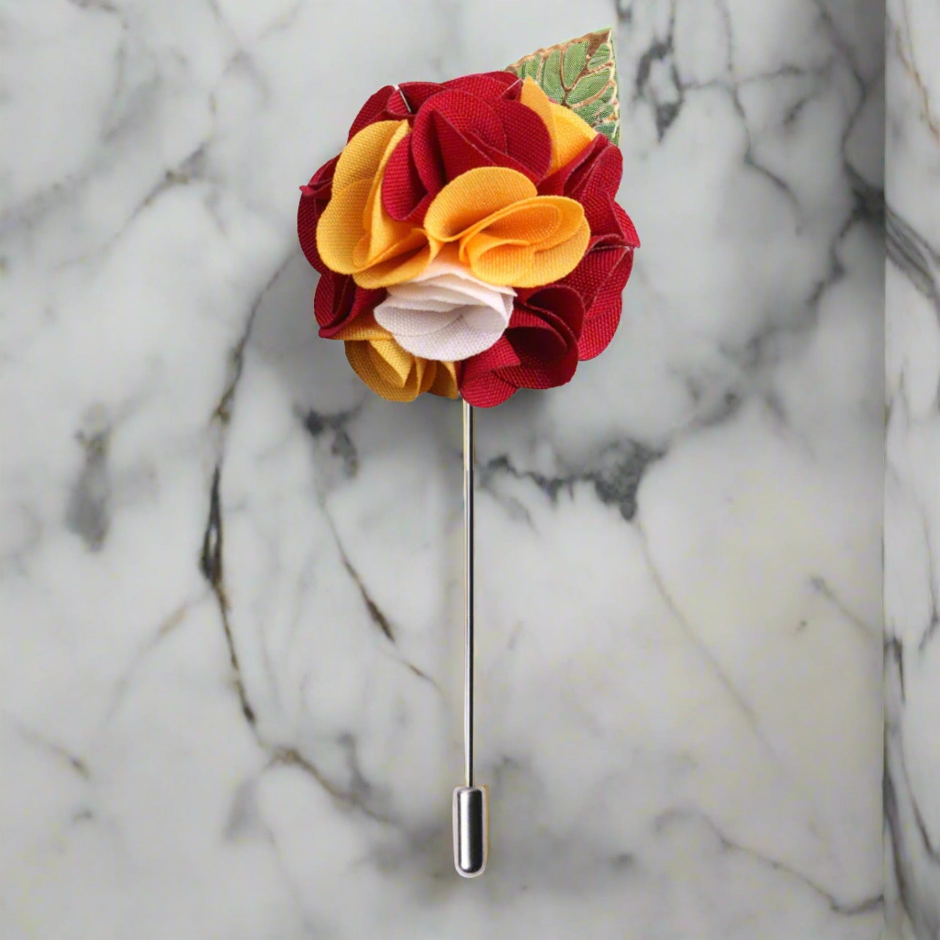 Stylish green flower lapel pin worn on a suit for a formal event.