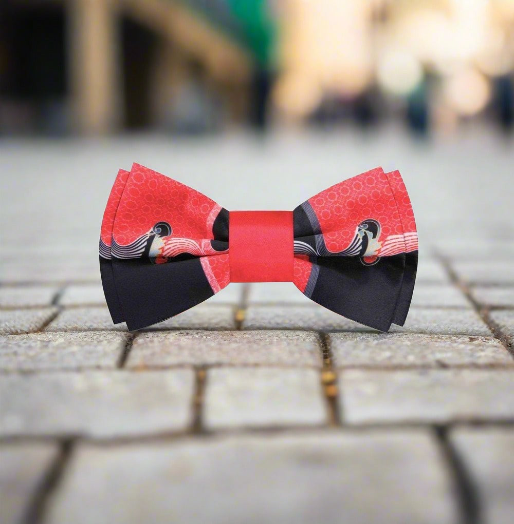 Detail shot of a premium abstract wave bow tie paired with a tuxedo