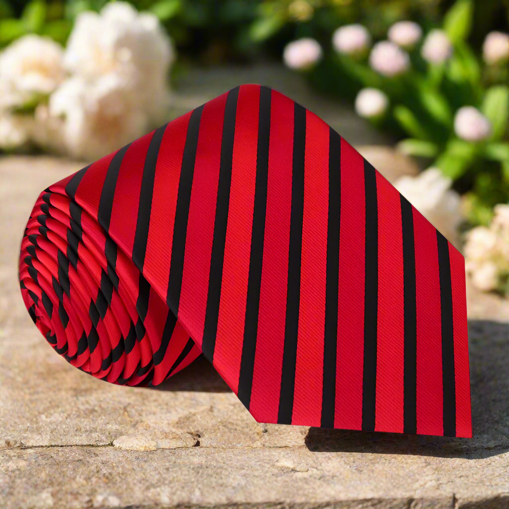 Vibrant yellow and blackened blue stripe silk tie on a models neck