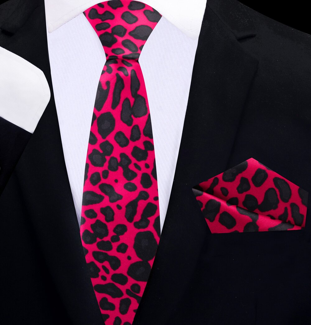Cheetah print necktie paired with a classic white dress shirt and charcoal grey suit.