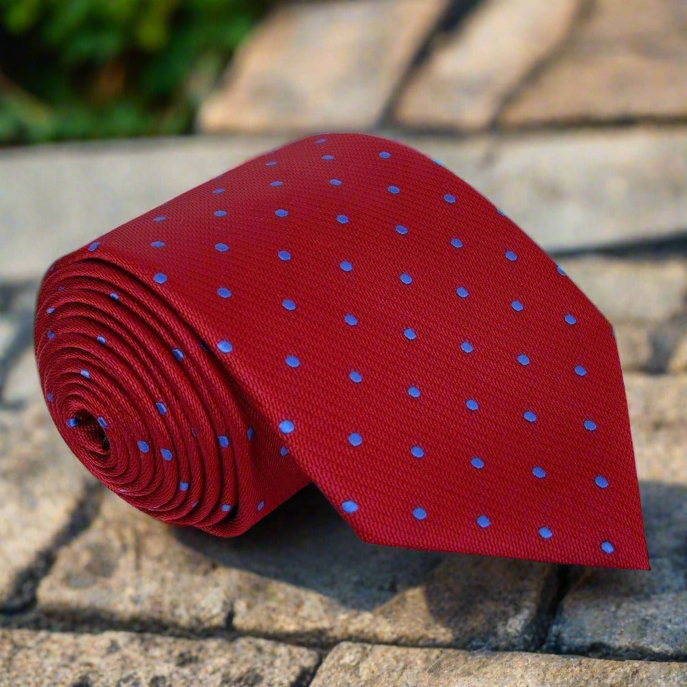 Close-up of green polka dot tie, showcasing its vibrant dots and silk texture.