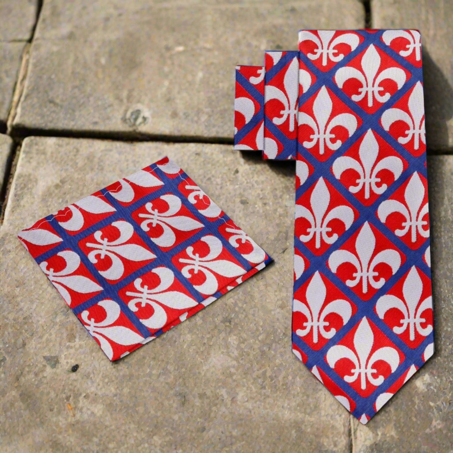 Stylish man wearing a fleur-de-lis necktie at a formal event.