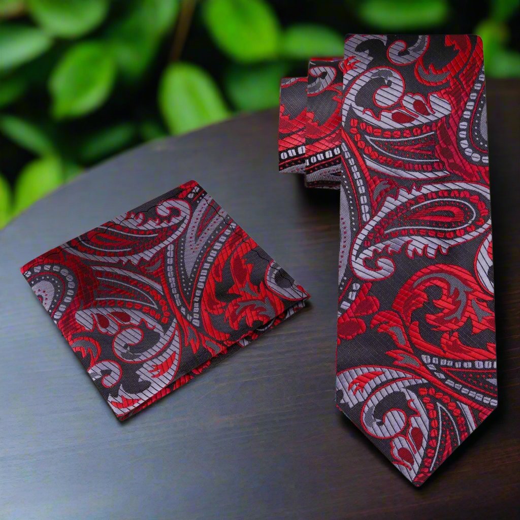 Styled paisley tie paired with a white shirt and navy suit for wedding attire