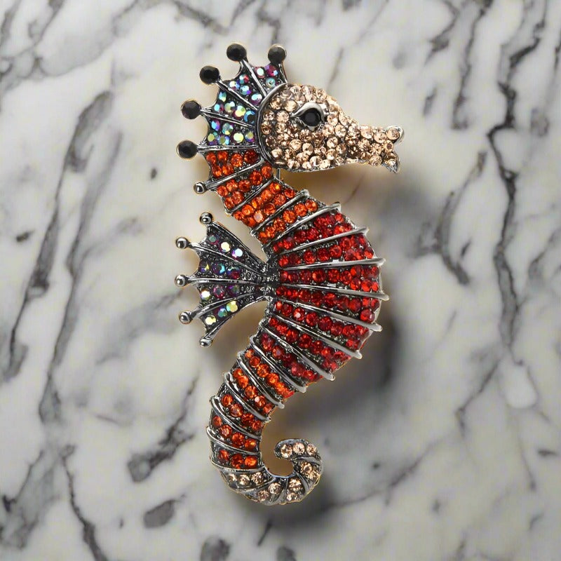 Close-up of a gemstone lion lapel pin with detailed craftsmanship