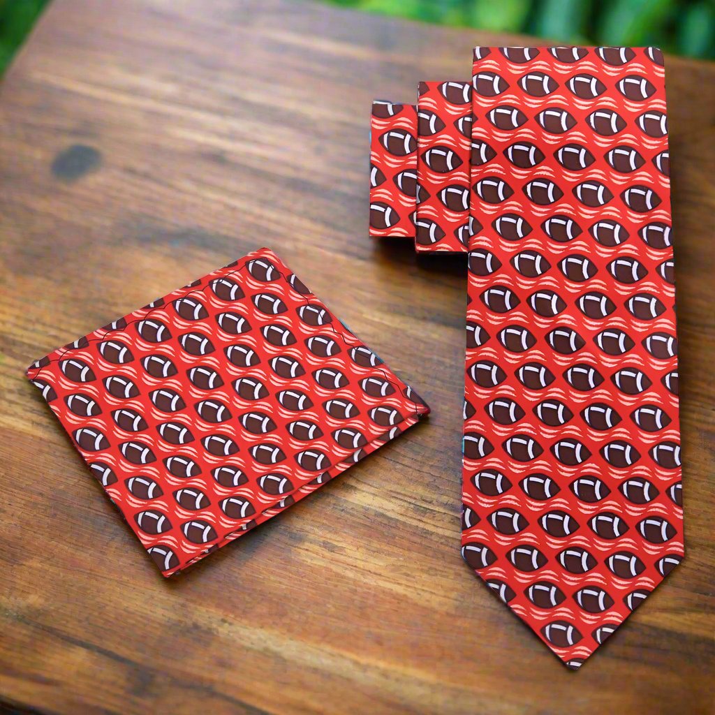Close-up of blue football tie with brown football pattern for sports fans
