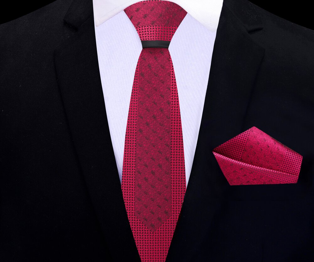 Stylish necktie paired with a crisp white dress shirt and charcoal grey suit for a corporate presentation.