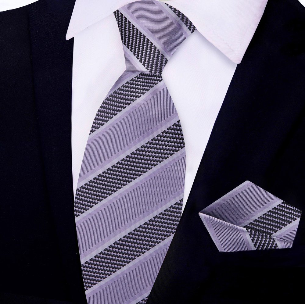 Man wearing a formal necktie for business meetings with a matching handkerchief