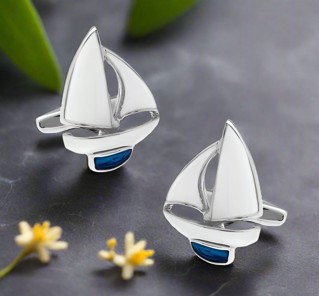 Stylish sailboat cufflinks with navy blue and chrome finish, perfect for formal occasions