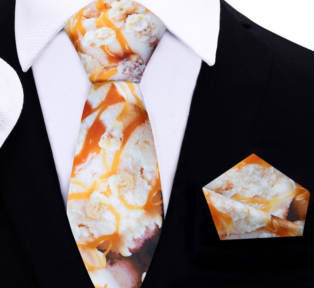 Silk necktie with playful caramel drizzle pattern, ideal for casual and networking events