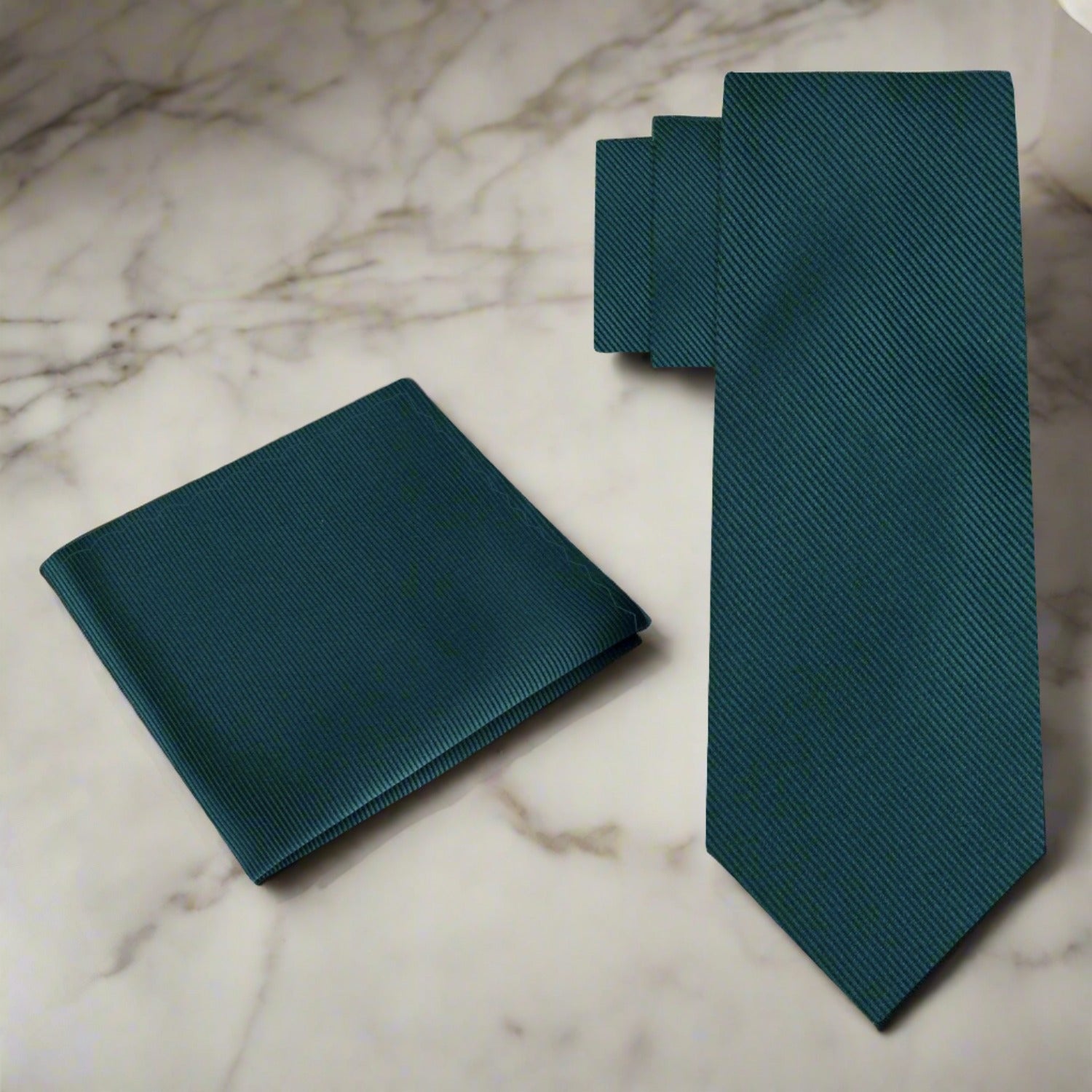 Bright red silk necktie paired with a white dress shirt for a sophisticated look.