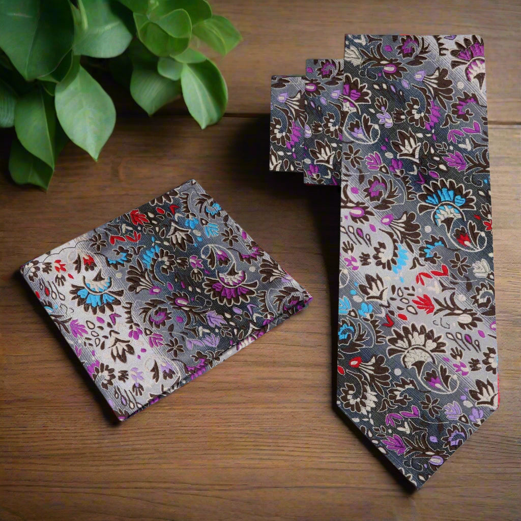 Close-up of a silk floral tie showing detailed floral pattern and elegant design