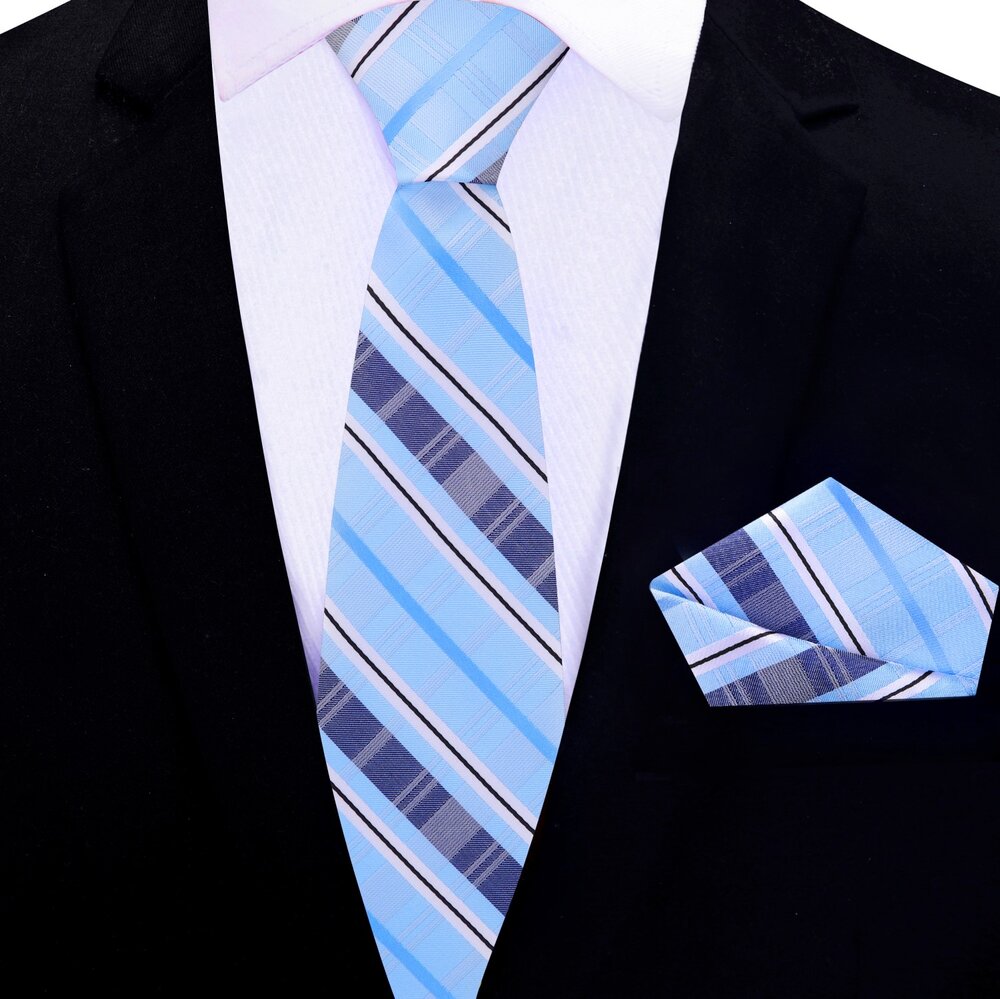 Flat lay of the Arcadia plaid tie with matching pocket square, showcasing vibrant colors