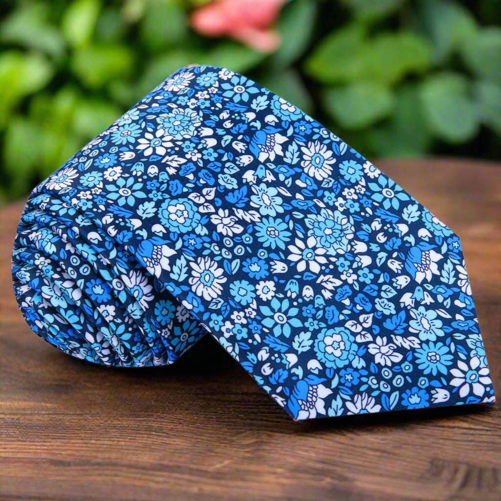 Blue floral silk necktie with small flower pattern for weddings and formal occasions