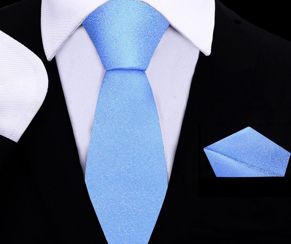 Close-up of Carolina blue silk kids tie with shimmer texture, folded neatly