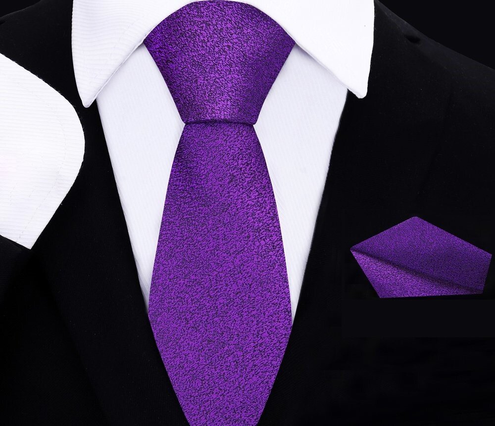 Close-up of shimmering purple tie and pocket square set for children's formal wear.