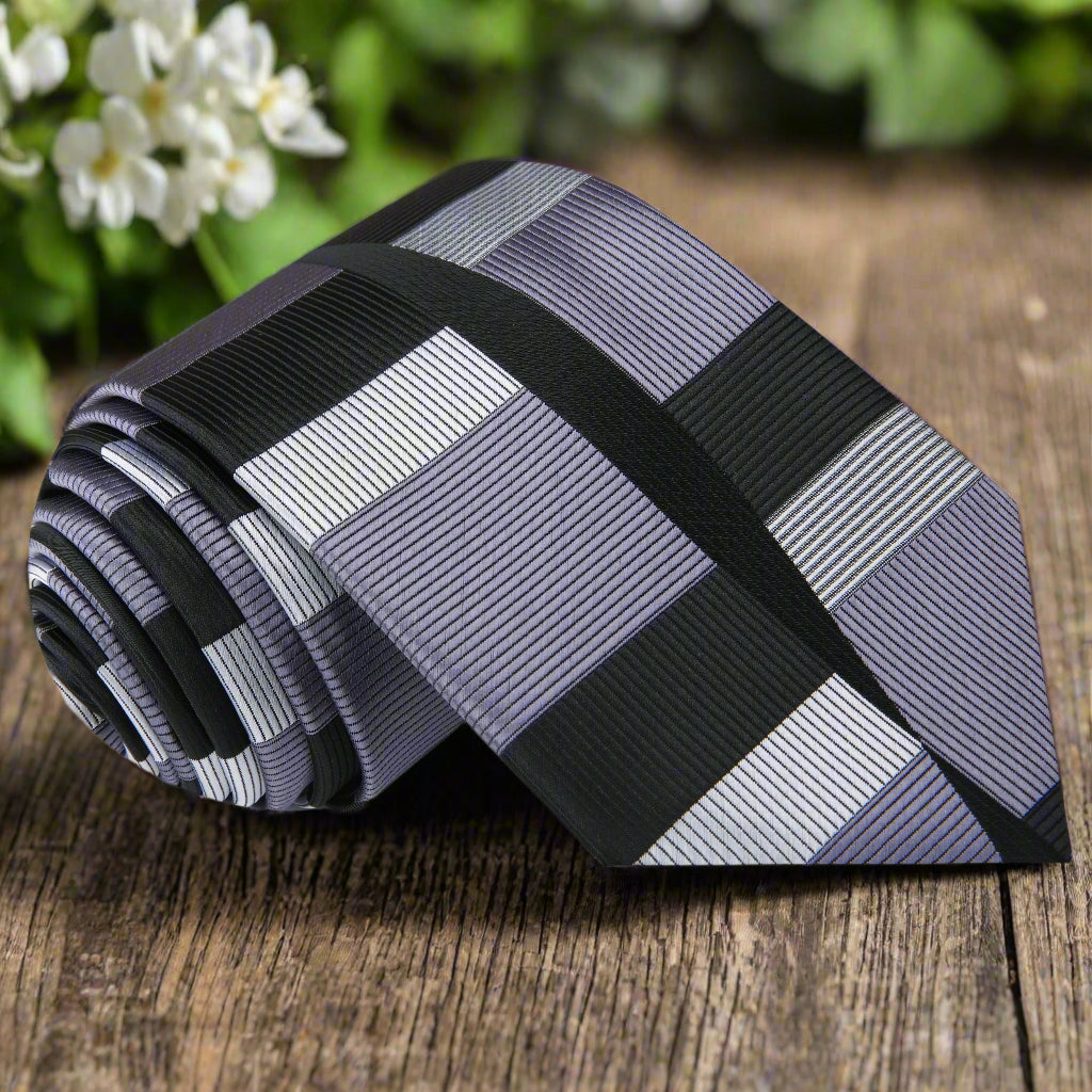 Close-up of a modern abstract pattern silk tie in vibrant colors