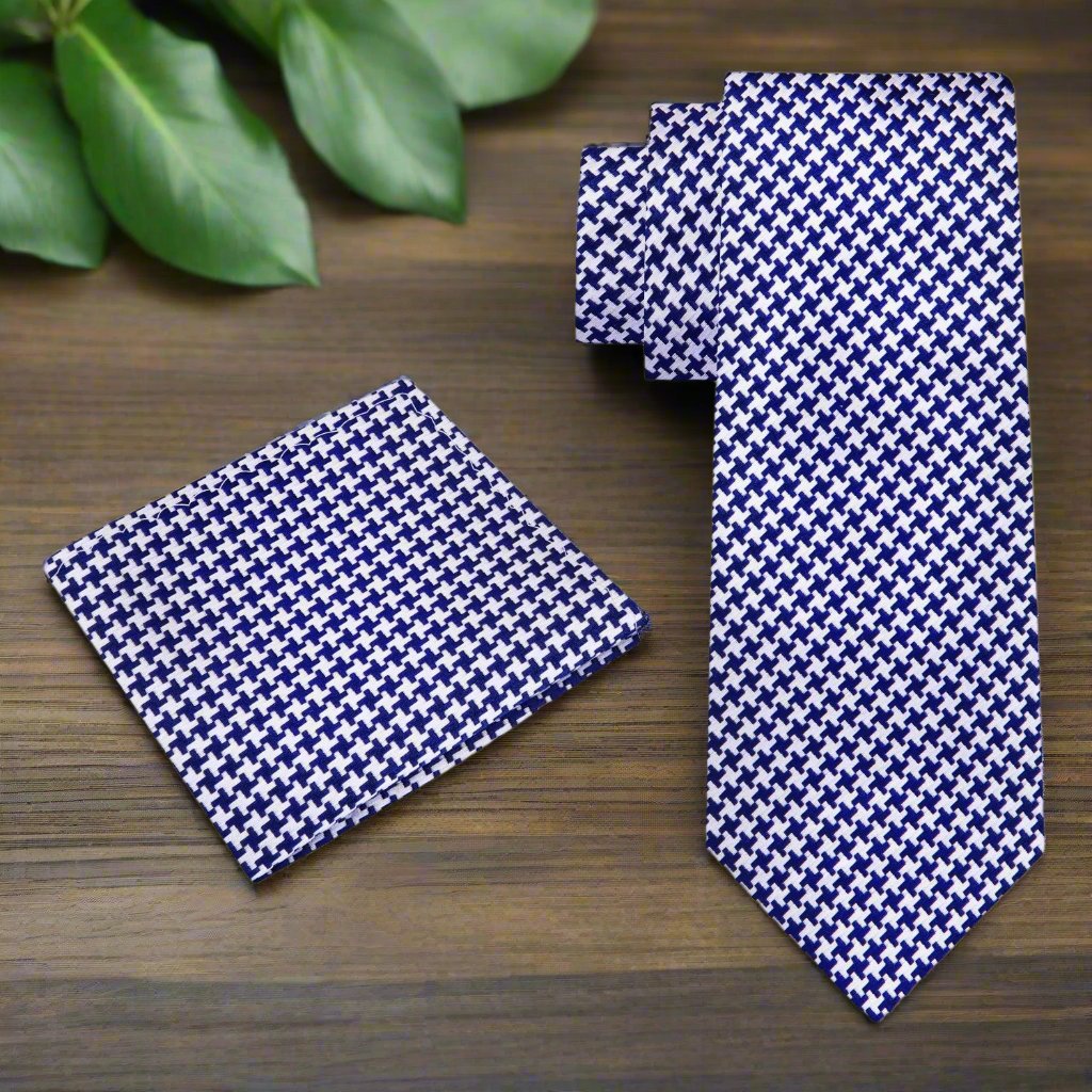 Matching pocket square in gold and black houndstooth design complementing the necktie