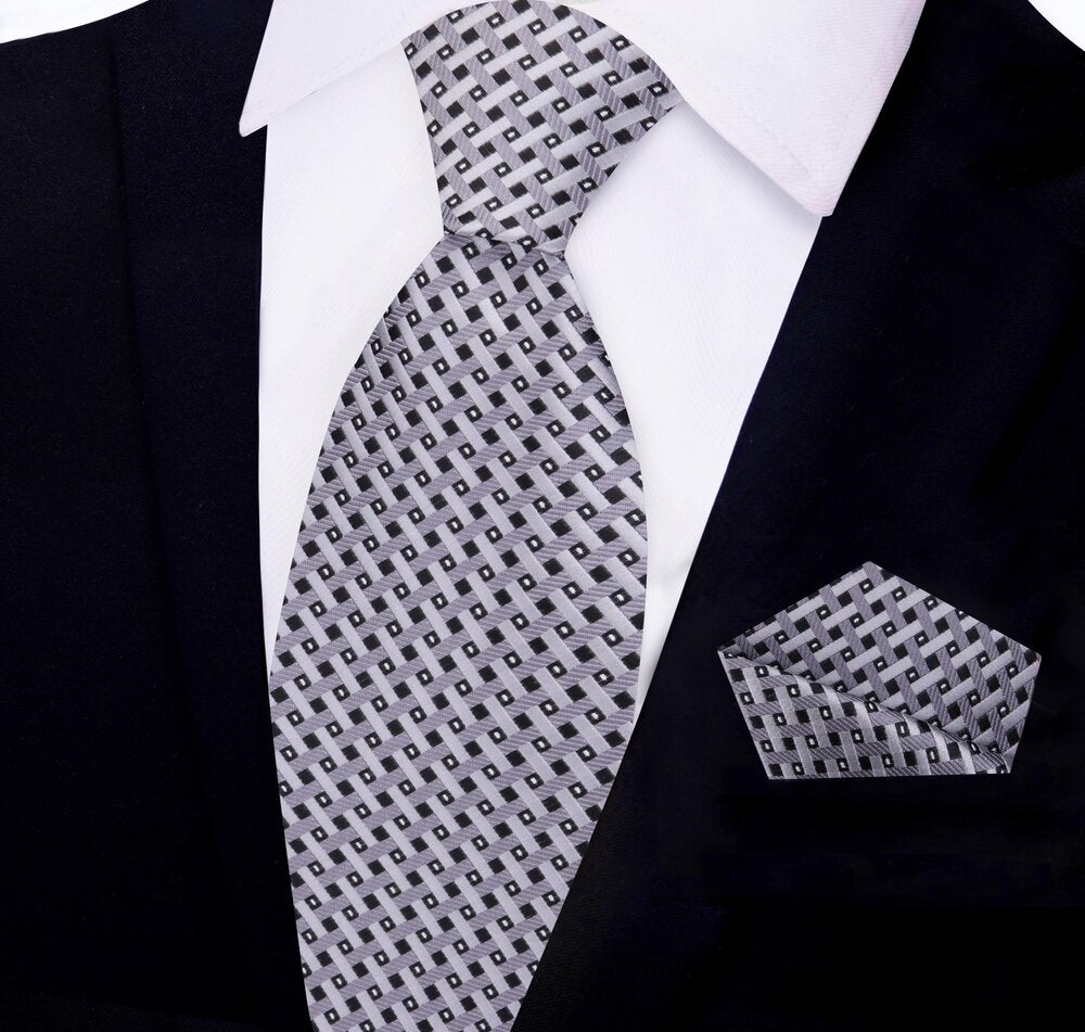 Stylish mens gold silk tie paired with a white dress shirt for business